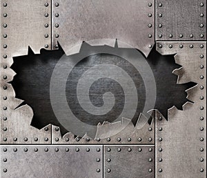 Damaged metal armor with torn hole background photo