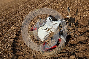 Damaged motorbike after collision with wild animal