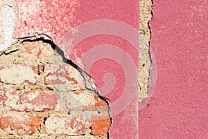 Damaged plaster house.