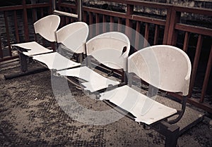 Damaged plastic chairs