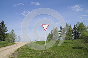 Damaged road sign & x22;give way& x22;