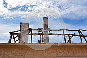 Damaged roof with fallen tiles after storm disaster