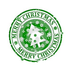 Damaged round green stamp with the words - Merry Christmas