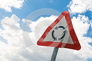 Damaged roundabout sign