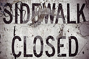 Damaged Sidewalk Closed Sign