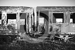 Damaged train wagons in an old abandoned railway network