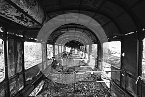 Damaged train wagons in an old abandoned railway network