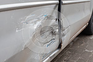 Damaged vehicle detail, scratches on the doors