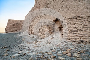 Damaged wall of Djanpik qala fortress in Karakalpakstan region o photo