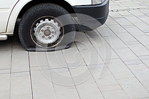 Damaged wheel tire of old vehicle