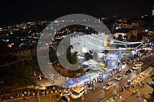 Damascus Gate entrance at Old City Jerusalem Palestine Israel at night with lights during Ramadan