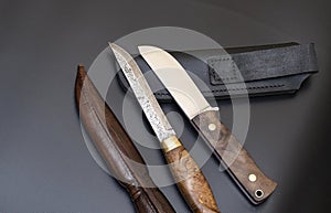 Damascus steel knives on a black background. Kitchen knives. background with japanese knife.