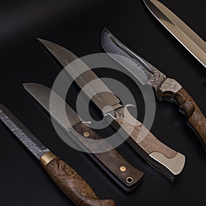 Damascus steel knives on a black background. Kitchen knives. background with japanese knife.