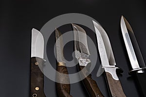 Damascus steel knives on a black background. Kitchen knives. background with japanese knife.