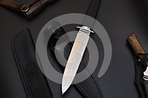 Damascus steel knives on a black background. Kitchen knives. background with japanese knife.