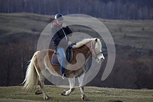 Dambovita Runcu October 19, 2021, tourists relaxing on horseback in the Leaota Mountains