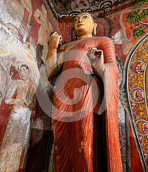 Dambulla Golden Cave Temple: Buddha statues carved on the rocks.