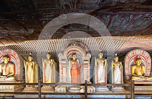 Dambulla Golden Cave Temple: Buddha statues carved on the rocks.