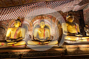 Dambulla Golden Cave Temple: Buddha statues carved on the rocks.