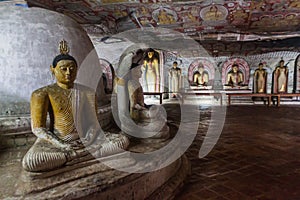 DAMBULLA, SRI LANKA - JULY 20, 2016: Buddha statues in a cave of Dambulla cave temple, Sri Lan