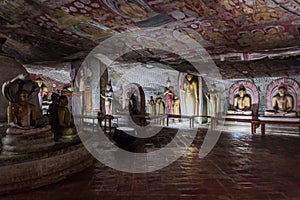 DAMBULLA, SRI LANKA - JULY 20, 2016: Buddha statues in a cave of Dambulla cave temple, Sri Lan