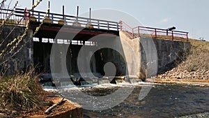 Damm on small river. gateway lock construction.