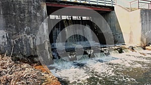 Damm on small river. gateway lock construction.