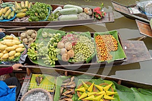 Damnoen Saduak Floating Market or Amphawa. Local people sell fruits, traditional food on boats in canal, Ratchaburi District,