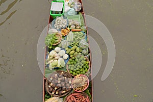 Damnoen Saduak Floating Market or Amphawa. Local people sell fruits, traditional food on boats in canal, Ratchaburi District,
