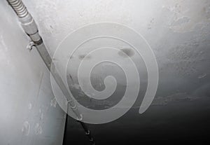 dampness moisture on ceiling with drops of water infiltration