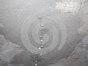dampness moisture on ceiling with drops of water infiltration photo