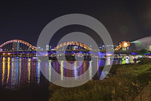 Dragon bridge cross Han river at Danang city in Vietnam