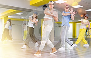 Dance class for teenages, girl and boy training in dance studio