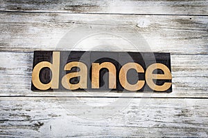 Dance Letterpress Word on Wooden Background