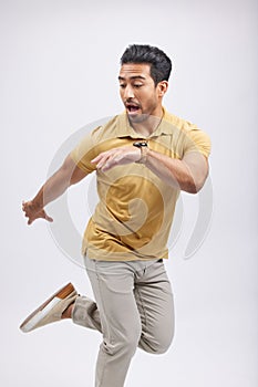 Dance, movement and man in studio for freedom, energy and performance on white background. Creative, balance and happy