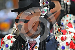 The dance of the negritos, or Cofradia de los Negritos,mask peruvian dancer