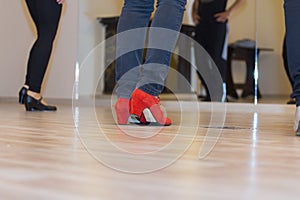 People practicing dance steps