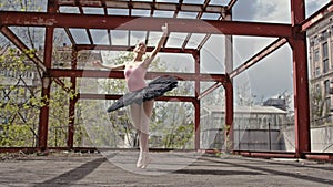 Dance performance of a ballerina dancing in an urban landscape.