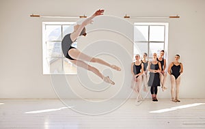 Dance studio, ballet and jump in air while class watches girl student move with agility and grace. Ballerina woman with