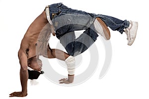 Dancer balancing his knees with his elbows