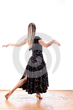 Dancer in ballroom against white background