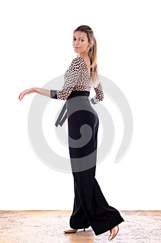 Dancer in ballroom against white background