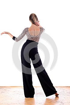 Dancer in ballroom against white background