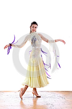 Dancer in ballroom against white background