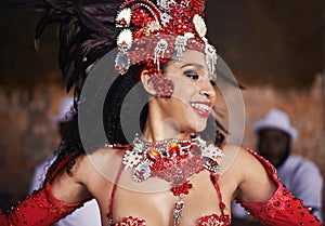 Dancer, carnival and girl with band, happy and pride for culture with group for music performance in night. Woman, men