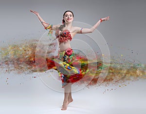 Dancer with disintegrating dress.