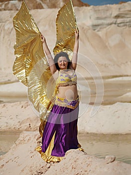 Dancer with gold wings
