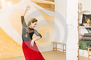 dancer moving arms in a dance studio