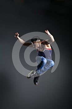 Dancer posing in front of the studio background