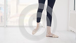 Dancer practicing dance movement legs